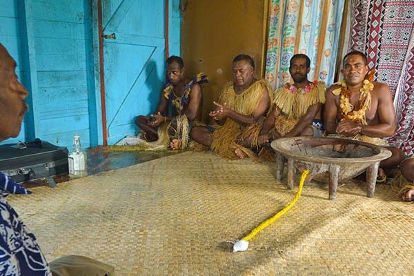 people in a kava ceremony